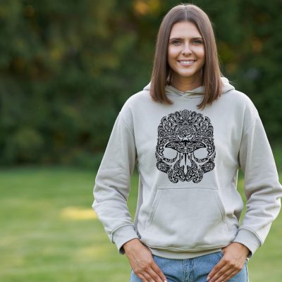 Young woman in beige hoodie. High quality photo